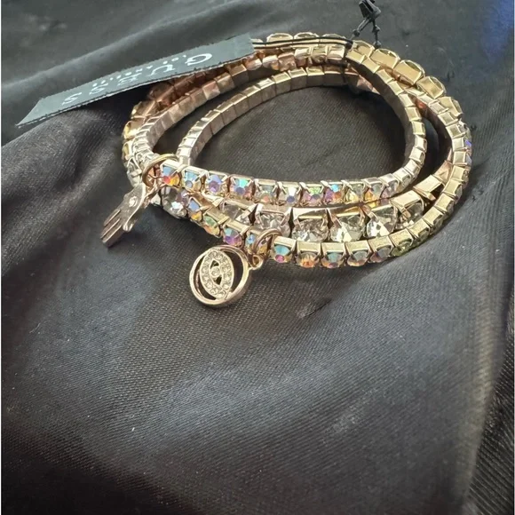 Guess Trio Rose Gold Tone Bling Stretch Bracelets w/a Hamsa & a Evil Eye Charms - Picture 2 of 6